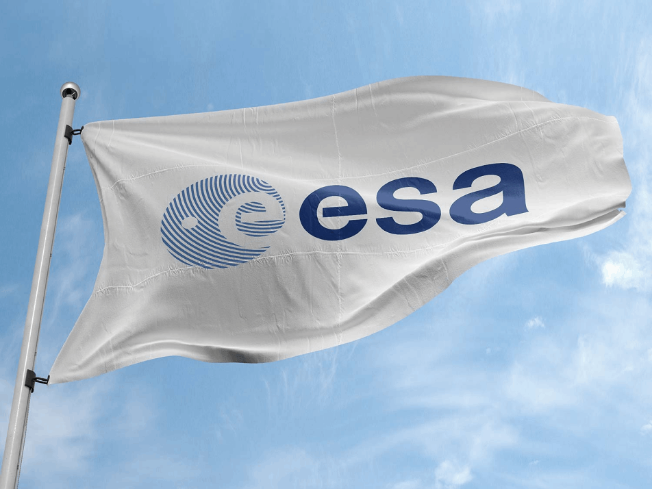 The ESA flag waving in the breeze beneath a blue sky